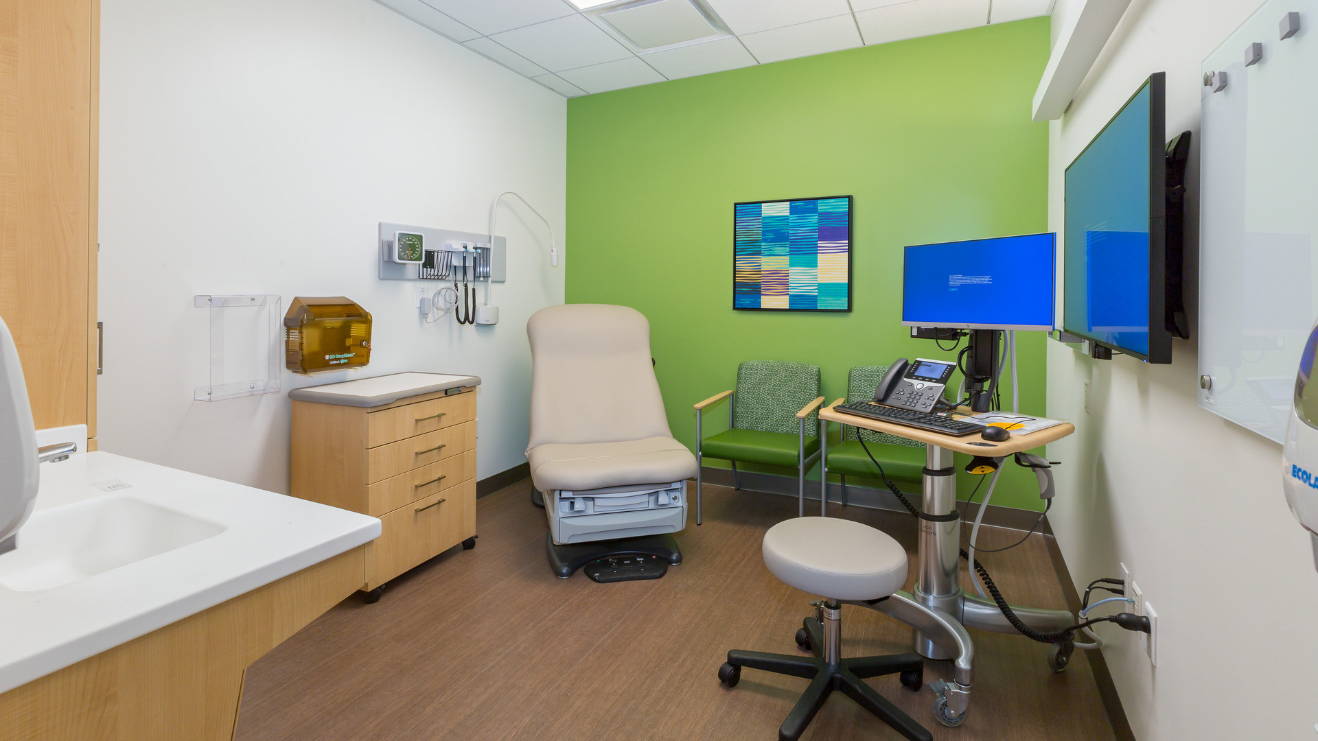 A typical patient examination room at a healthcare facility.